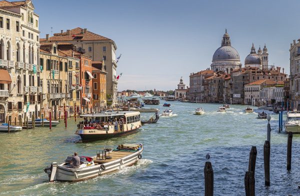Experience the football tournament in Italy and travel through Venice by boat