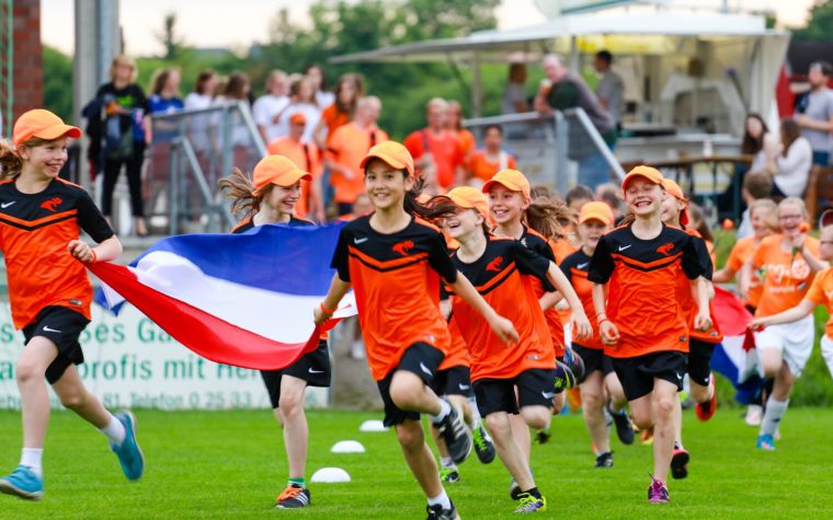 International football tournaments for junior women, running in at the opening ceremony